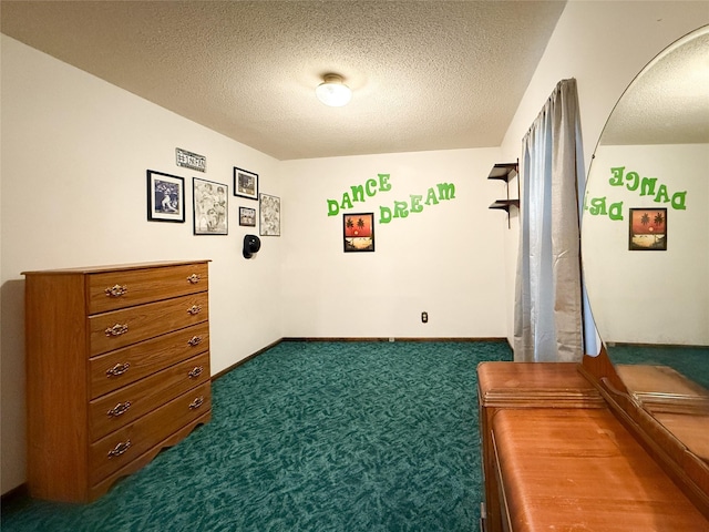 1545 5th St, Boone, IA 50036 - bedroom featuring dark carpet and a textured ceiling