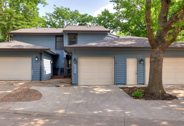 6196 Terrace Dr Unit 2, Johnston, IA 50131 - view of front facade featuring concrete driveway and a garage