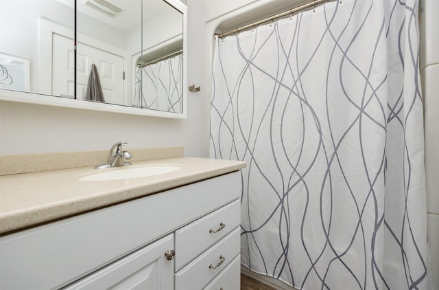 6196 Terrace Dr Unit 2, Johnston, IA 50131 - full bathroom featuring vanity and a shower with curtain