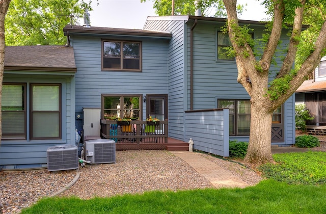 6196 Terrace Dr Unit 2, Johnston, IA 50131 - back of house featuring central air condition unit and a wooden deck