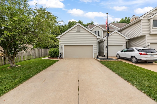 3916 92nd Dr, Urbandale, IA 50322 - view of front facade with driveway and an attached garage