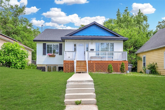 1908 E Walnut St, Des Moines, IA 50316 - bungalow-style house with a front lawn and a porch