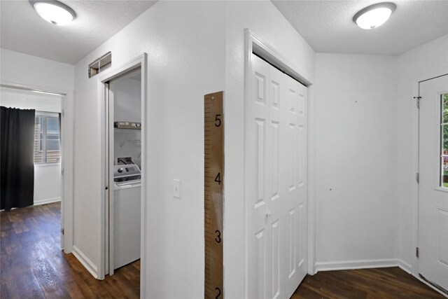 1908 E Walnut St, Des Moines, IA 50316 - hallway featuring dark wood-style floors, washer / dryer, and baseboards