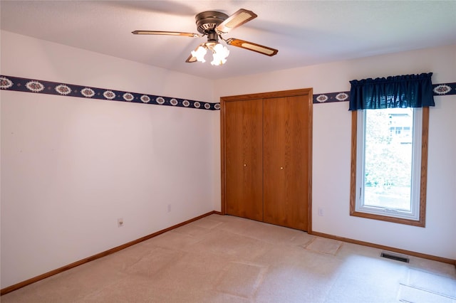 1126 SE Mallard Creek Dr, Ankeny, IA 50021 - unfurnished bedroom featuring multiple windows, baseboards, and a closet