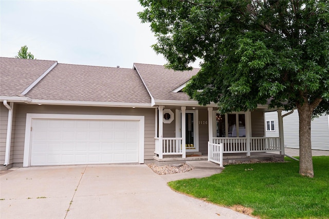 1126 SE Mallard Creek Dr, Ankeny, IA 50021 - ranch-style home featuring a porch, driveway, a shingled roof, and an attached garage