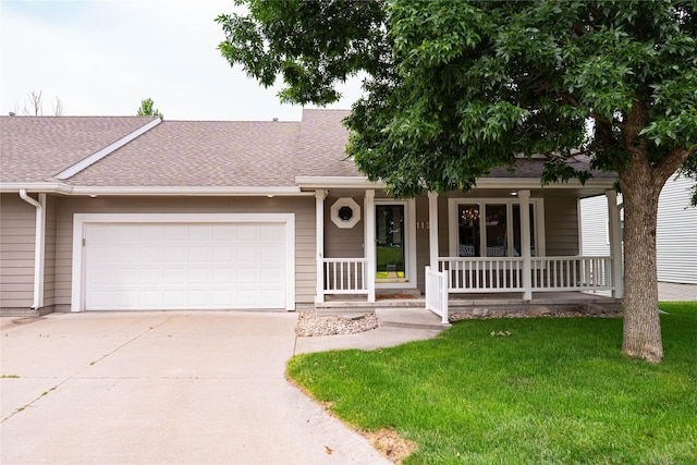 1126 SE Mallard Creek Dr, Ankeny, IA 50021 - view of front of property featuring a porch, an attached garage, concrete driveway, a shingled roof, and a front yard