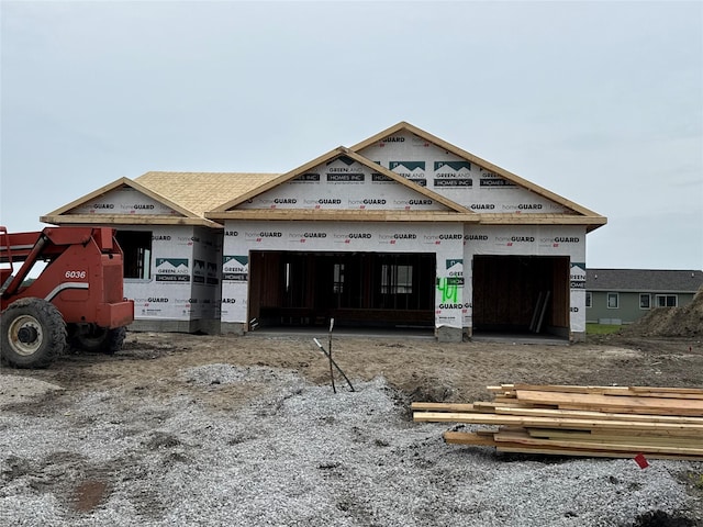401 NE Chalet St, Elkhart, IA 50073 - unfinished property with a garage