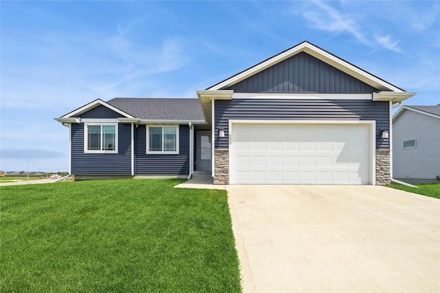 602 NE 57th St, Ankeny, IA 50021 - ranch-style house featuring an attached garage, a front lawn, driveway, stone siding, and board and batten siding