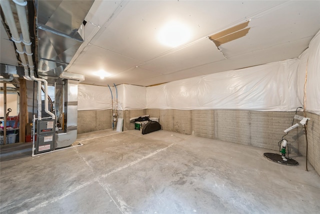 602 NE 57th St, Ankeny, IA 50021 - unfinished basement featuring heating unit