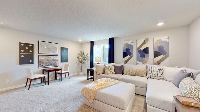 480 Kinley Dr, Waukee, IA 50263 - living room with light carpet, baseboards, and recessed lighting