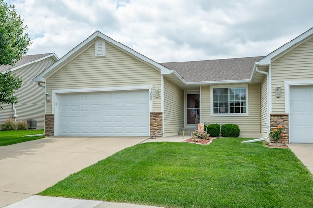 168 SE Sweetgrass Ln, Pleasant Hill, IA 50327 - ranch-style house featuring stone siding, roof with shingles, an attached garage, and concrete driveway