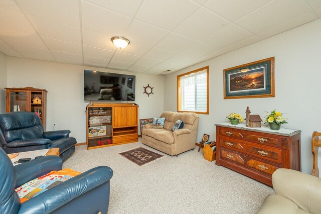 168 SE Sweetgrass Ln, Pleasant Hill, IA 50327 - carpeted living room with a paneled ceiling
