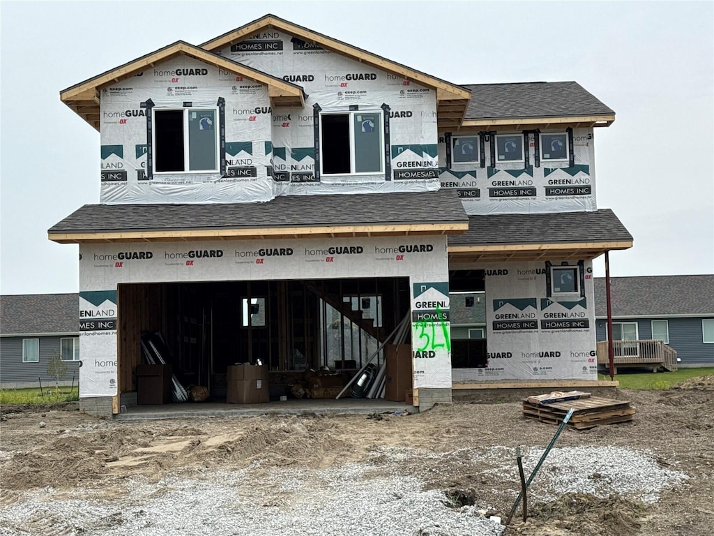 321 NE Chalet St, Elkhart, IA 50073 - property under construction with a garage and roof with shingles