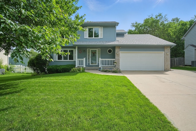 4623 62nd St, Urbandale, IA 50322 - view of front of home featuring a garage, driveway, covered porch, roof with shingles, and brick siding