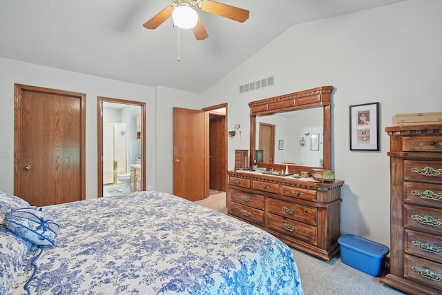 4623 62nd St, Urbandale, IA 50322 - bedroom with light colored carpet, vaulted ceiling, a ceiling fan, and ensuite bathroom