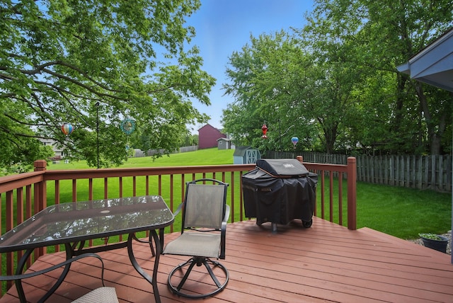4623 62nd St, Urbandale, IA 50322 - wooden terrace with a storage shed, a fenced backyard, and grilling area