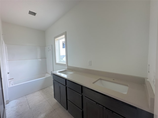 4192 NW 177th St, Clive, IA 50325 - bathroom featuring a bath and double vanity