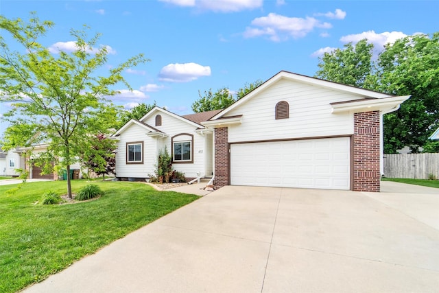 403 4th St NW, Altoona, IA 50009 - single story home with concrete driveway and brick siding