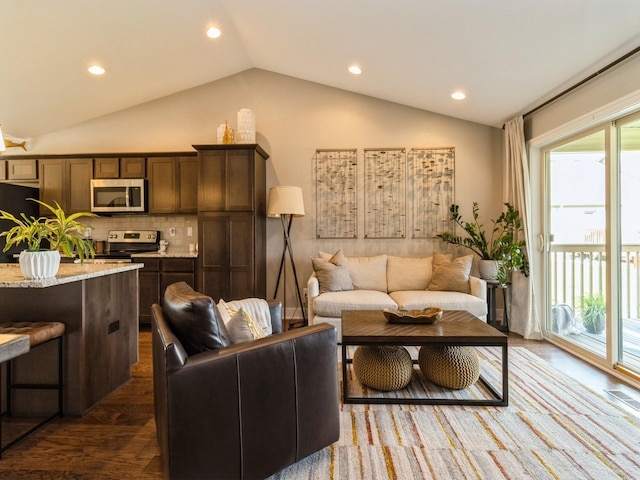 1102 NE 15th Ln, Ankeny, IA 50021 - living room with lofted ceiling, recessed lighting, and dark wood-type flooring