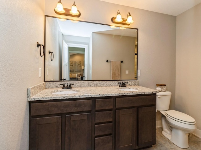 1102 NE 15th Ln, Ankeny, IA 50021 - bathroom featuring toilet and double vanity