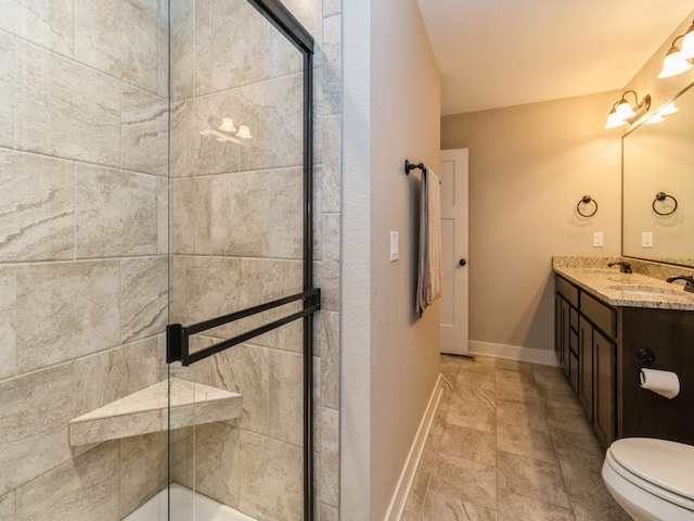 1102 NE 15th Ln, Ankeny, IA 50021 - bathroom featuring double vanity and a shower with door
