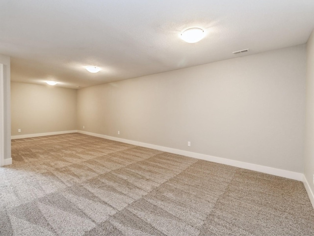 1102 NE 15th Ln, Ankeny, IA 50021 - carpeted empty room with baseboards