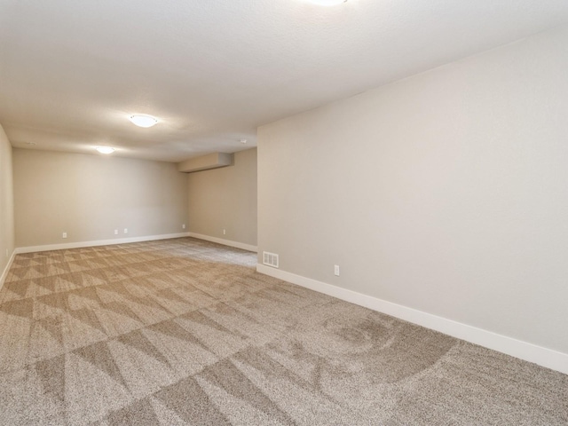 1102 NE 15th Ln, Ankeny, IA 50021 - empty room featuring light colored carpet and baseboards