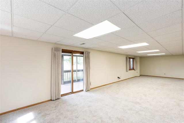 4922 Cedar Dr, West Des Moines, IA 50266 - carpeted spare room featuring baseboards and a drop ceiling