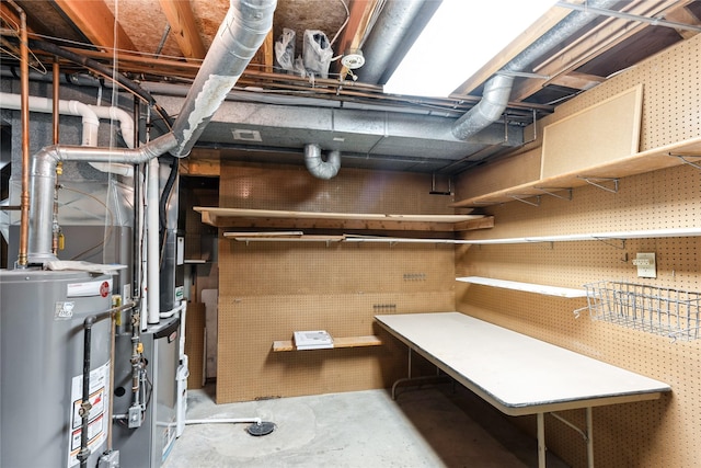 4922 Cedar Dr, West Des Moines, IA 50266 - unfinished below grade area featuring gas water heater and a workshop area