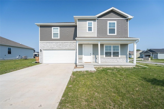 3451 10th Ave SW, Altoona, IA 50009 - view of front of house with stone siding, an attached garage, a porch, and a front lawn