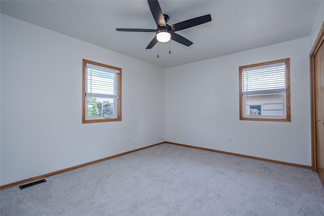 609 17th St, West Des Moines, IA 50265 - carpeted spare room featuring plenty of natural light and a ceiling fan