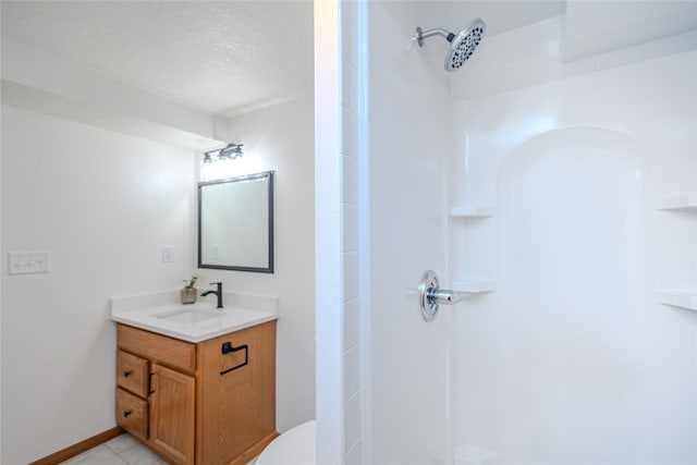 609 17th St, West Des Moines, IA 50265 - bathroom with vanity and a shower