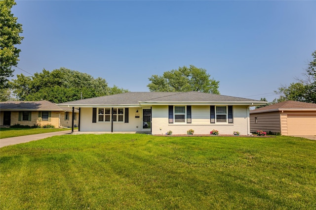609 17th St, West Des Moines, IA 50265 - ranch-style house featuring a front yard and brick siding