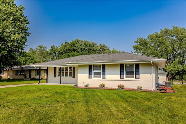609 17th St, West Des Moines, IA 50265 - ranch-style home featuring a front yard and brick siding
