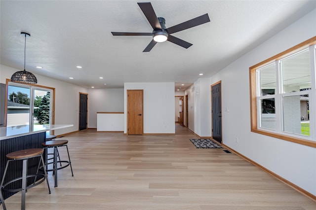 609 17th St, West Des Moines, IA 50265 - living room featuring light wood-style flooring, recessed lighting, and a ceiling fan