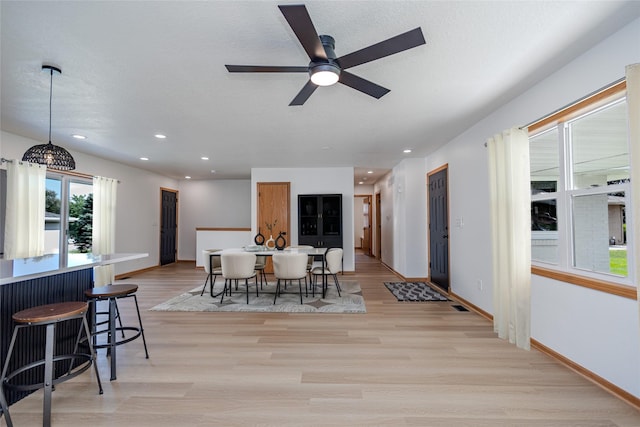 609 17th St, West Des Moines, IA 50265 - dining area featuring light wood finished floors, recessed lighting, and a ceiling fan