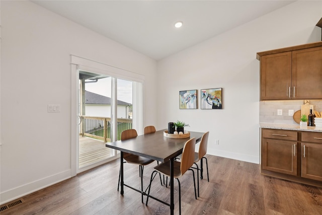 150 NW Hidden Knl, Waukee, IA 50263 - dining space with wood finished floors and recessed lighting