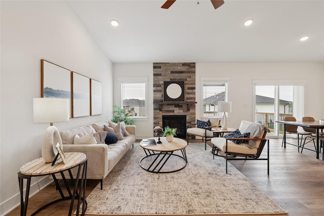 150 NW Hidden Knl, Waukee, IA 50263 - living room with plenty of natural light, ceiling fan, wood finished floors, recessed lighting, and a fireplace