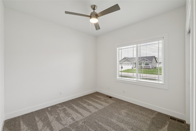 150 NW Hidden Knl, Waukee, IA 50263 - carpeted spare room featuring baseboards and ceiling fan