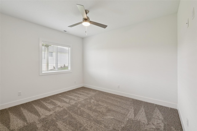 150 NW Hidden Knl, Waukee, IA 50263 - carpeted spare room with baseboards and ceiling fan