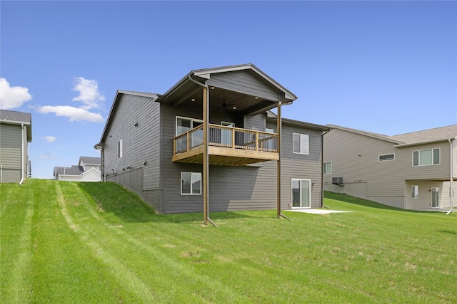 150 NW Hidden Knl, Waukee, IA 50263 - back of property with a lawn and a ceiling fan