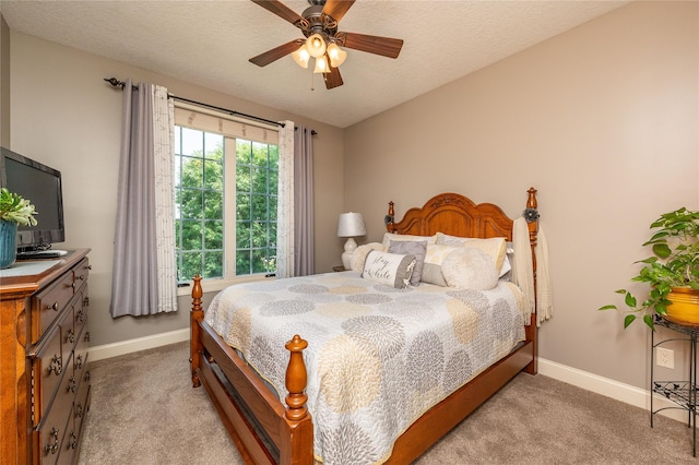 6725 NW 93rd St, Johnston, IA 50131 - bedroom featuring light carpet, ceiling fan, and a textured ceiling