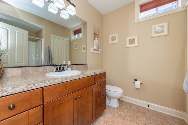 6725 NW 93rd St, Johnston, IA 50131 - bathroom featuring vanity, tile patterned floors, and a shower with door