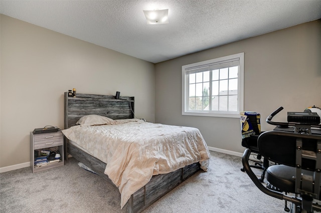 5462 Longview Ct Unit 1, Johnston, IA 50131 - carpeted bedroom featuring a textured ceiling and an office area