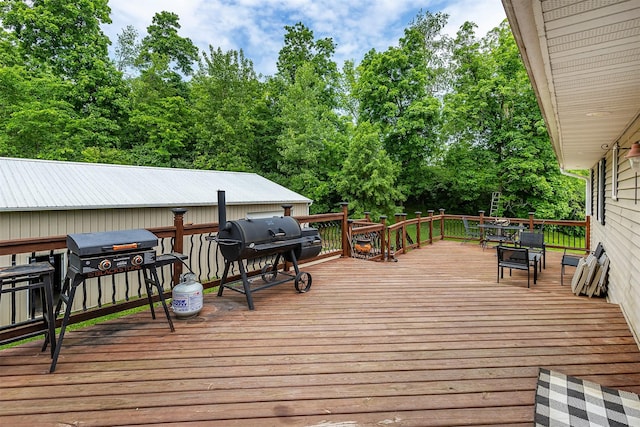 2626 SE 72nd St, Runnells, IA 50237 - deck with a grill and view of scattered trees