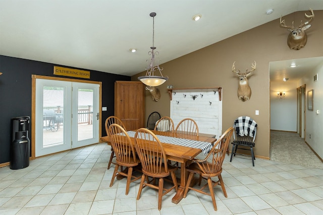 2626 SE 72nd St, Runnells, IA 50237 - dining space with lofted ceiling and light tile patterned floors