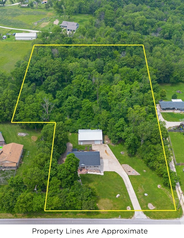 2626 SE 72nd St, Runnells, IA 50237 - aerial view of property's location featuring property boundaries highlighted and a forest