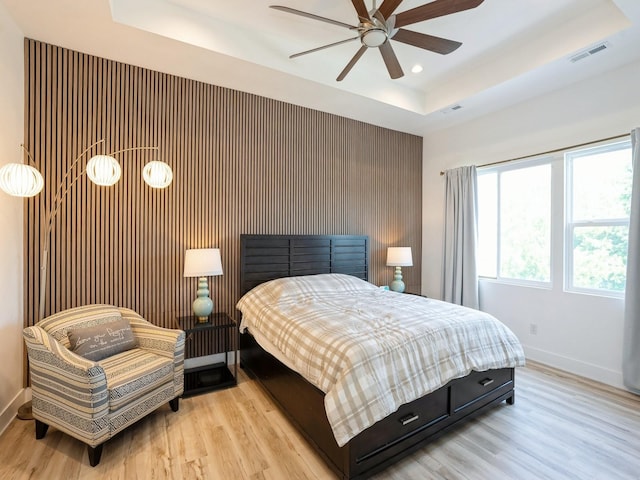 1010 Frederick Ave, Des Moines, IA 50315 - bedroom with a raised ceiling, recessed lighting, wood finished floors, and ceiling fan