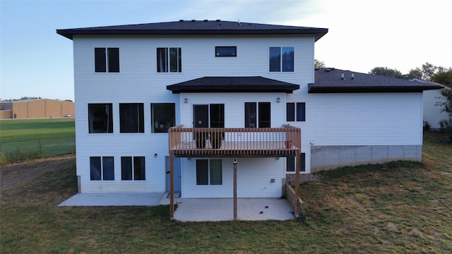 1010 Frederick Ave, Des Moines, IA 50315 - rear view of house with a patio area, a lawn, and a deck