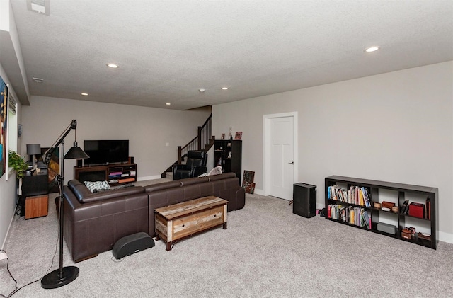 9180 Geanna Ct, West Des Moines, IA 50266 - carpeted living room featuring stairway, recessed lighting, and a textured ceiling